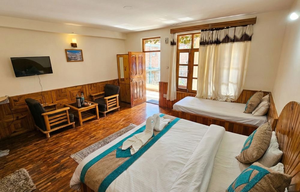 Deluxe Triple Room at Purnima Little Italy